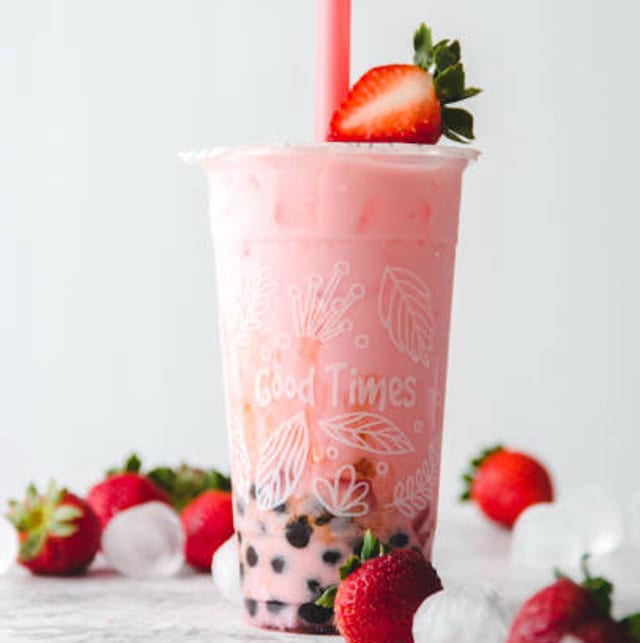 Strawberry sugar milk tea with bubble tea.